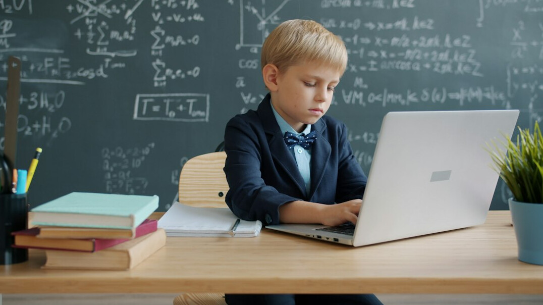 student learning programming in classroom
